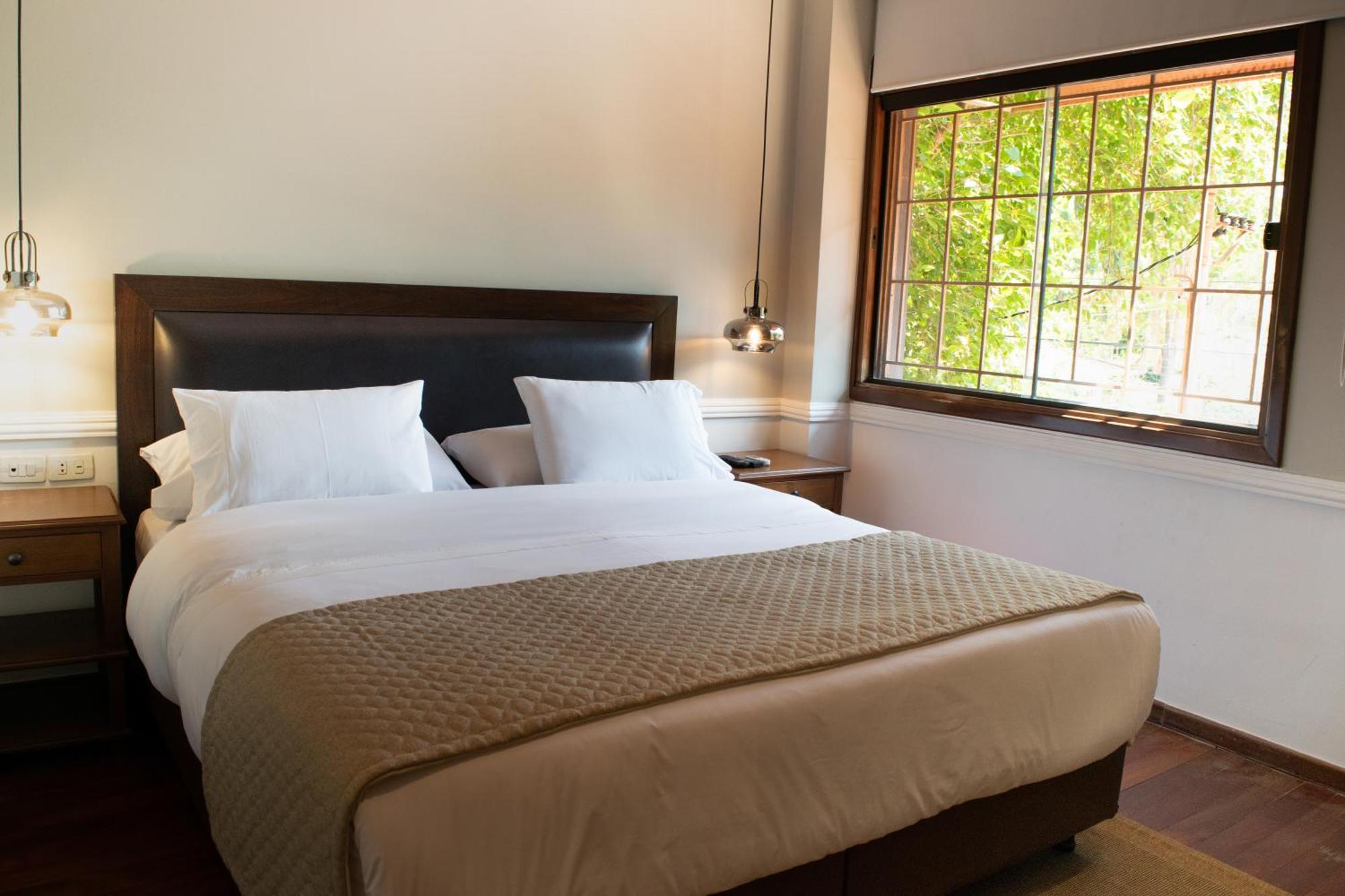 Las Lomas Casa Hotel อะซุนซิออง ภายนอก รูปภาพ